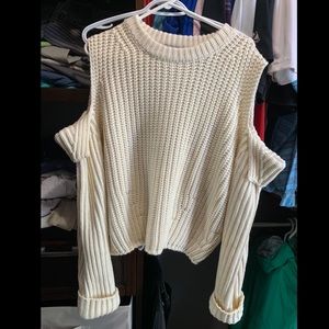 Sweater with cut out shoulders